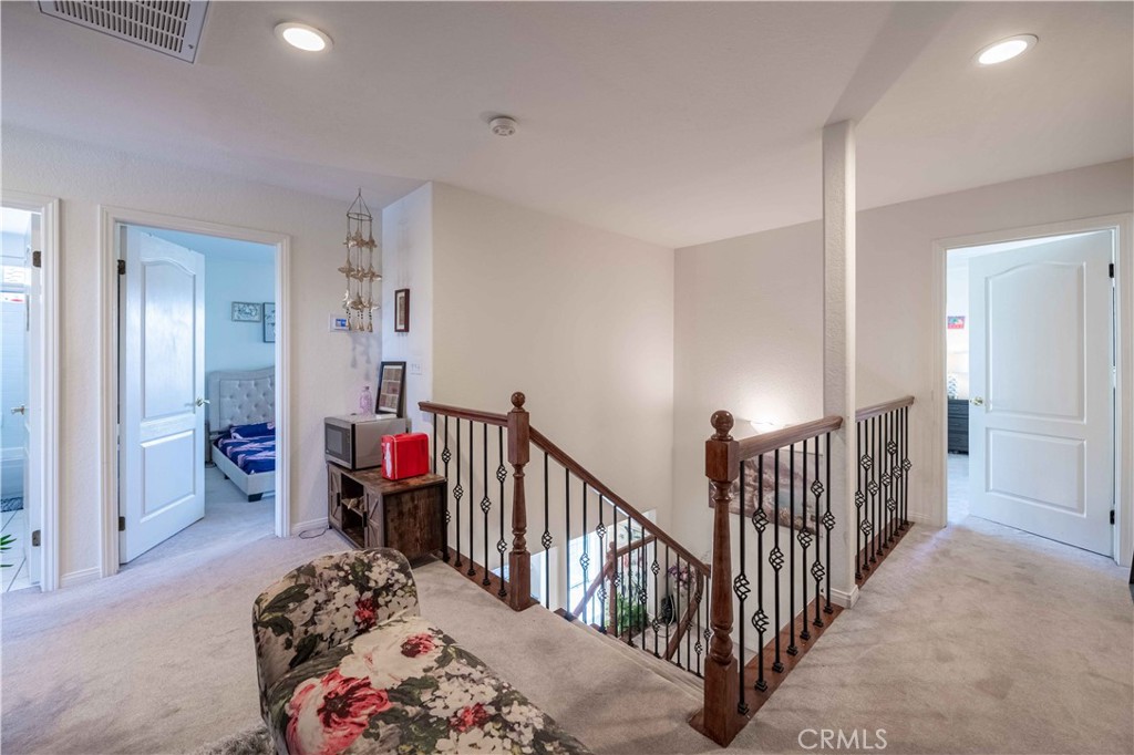 985 Brandon Avenue Simi Valley, CA 93065 - Photo 22 of 48 a bedroom with furniture and a large window