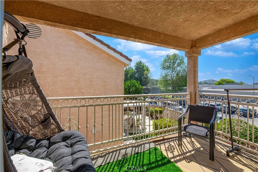 985 Brandon Avenue Simi Valley, CA 93065 - Photo 29 of 48 a view of a chair in the balcony