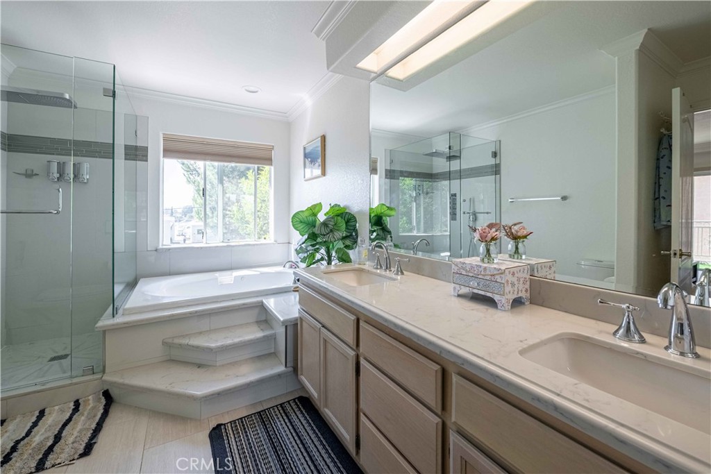 985 Brandon Avenue Simi Valley, CA 93065 - Photo 30 of 48 a bathroom with a sink and a bathtub