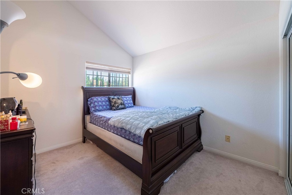 985 Brandon Avenue Simi Valley, CA 93065 - Photo 37 of 48 a bed sitting in a bedroom next to a window