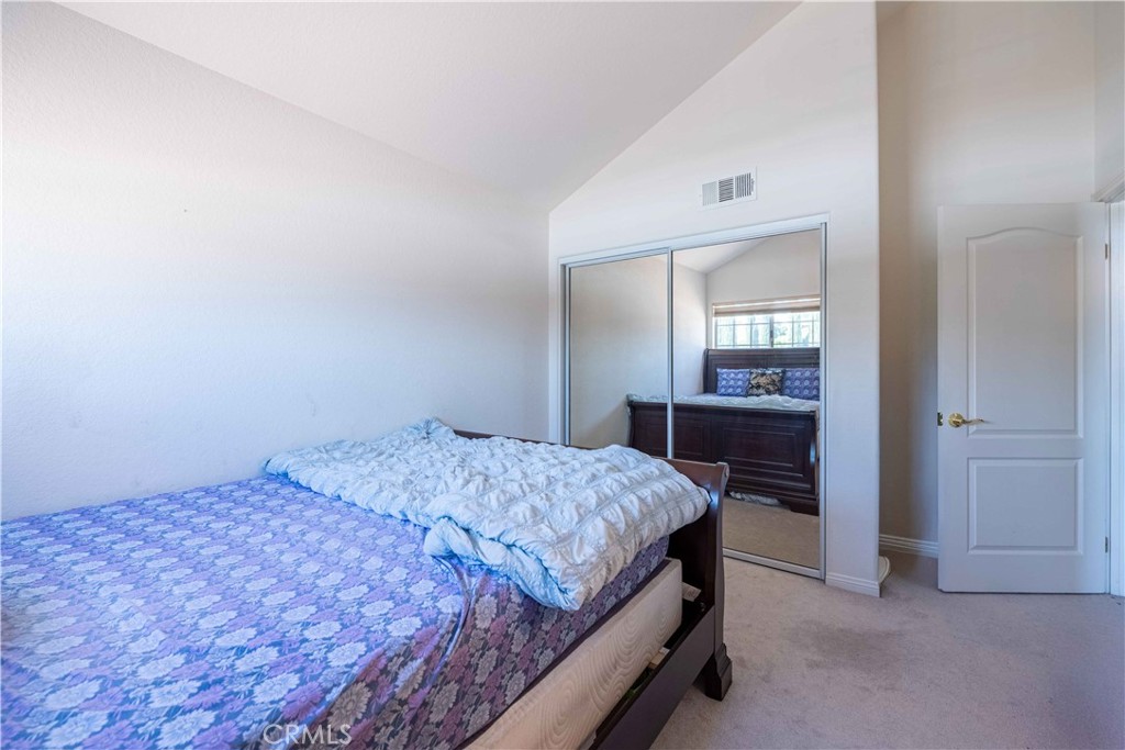 985 Brandon Avenue Simi Valley, CA 93065 - Photo 38 of 48 a bedroom with a bed and a dresser