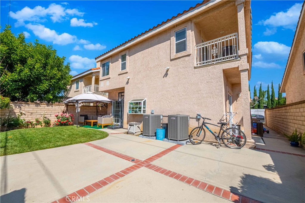 985 Brandon Avenue Simi Valley, CA 93065 - Photo 47 of 48 a front view of a house with a yard