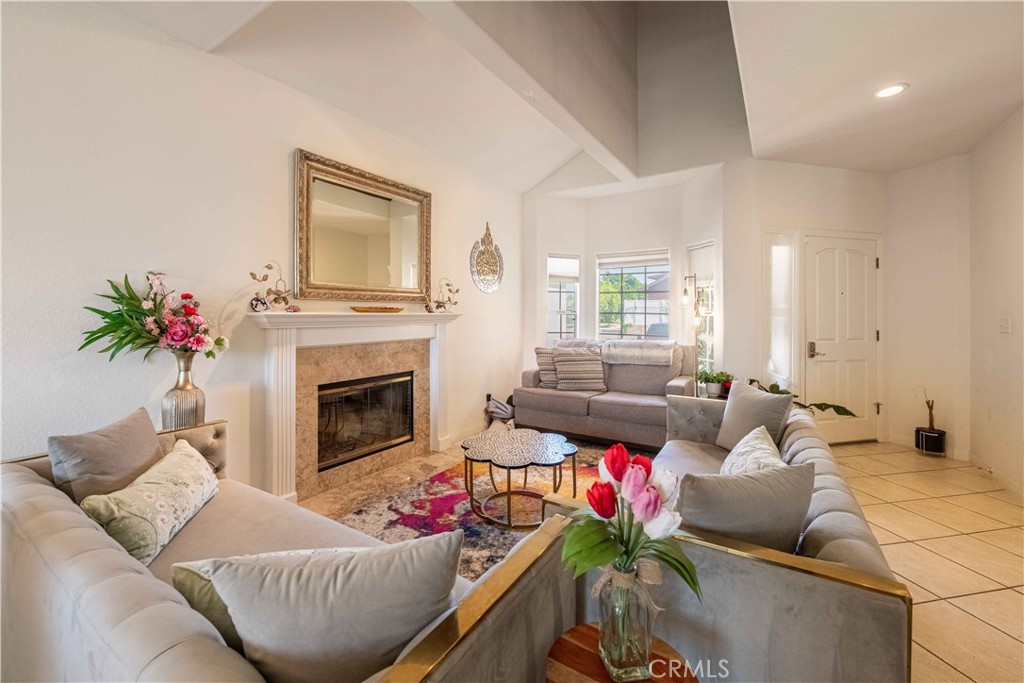 985 Brandon Avenue Simi Valley, CA 93065 - Photo 5 of 48 a living room with furniture and a fireplace