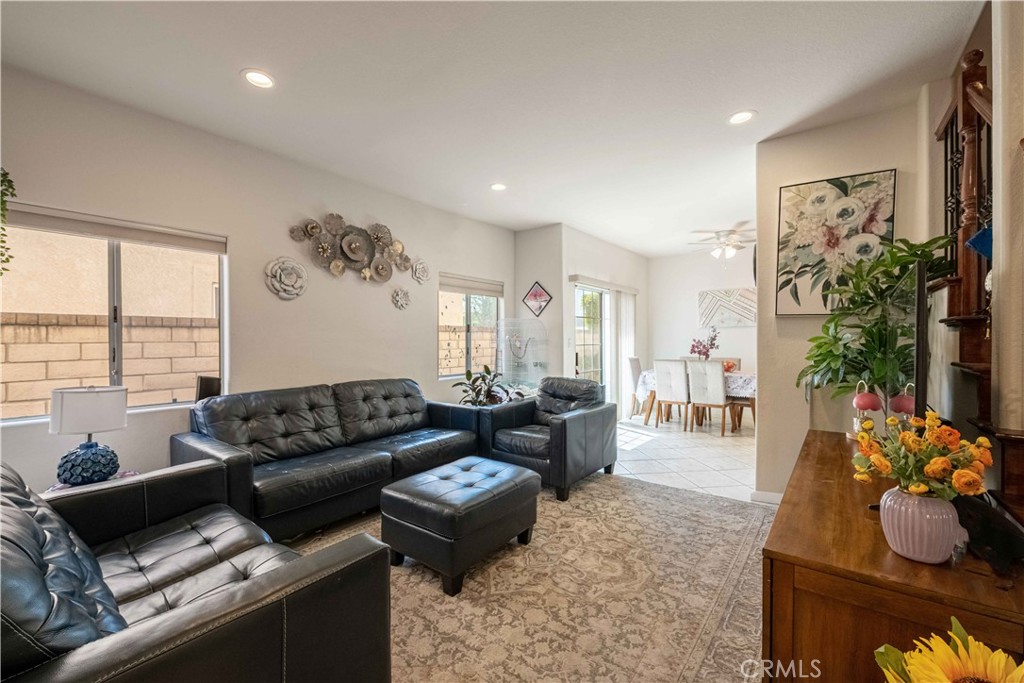 985 Brandon Avenue Simi Valley, CA 93065 - Photo 10 of 48 a living room with furniture and a large window