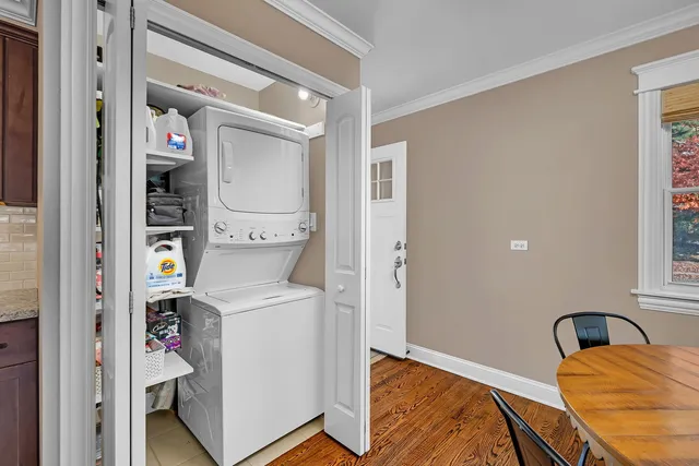 a bedroom with a bed and utility room