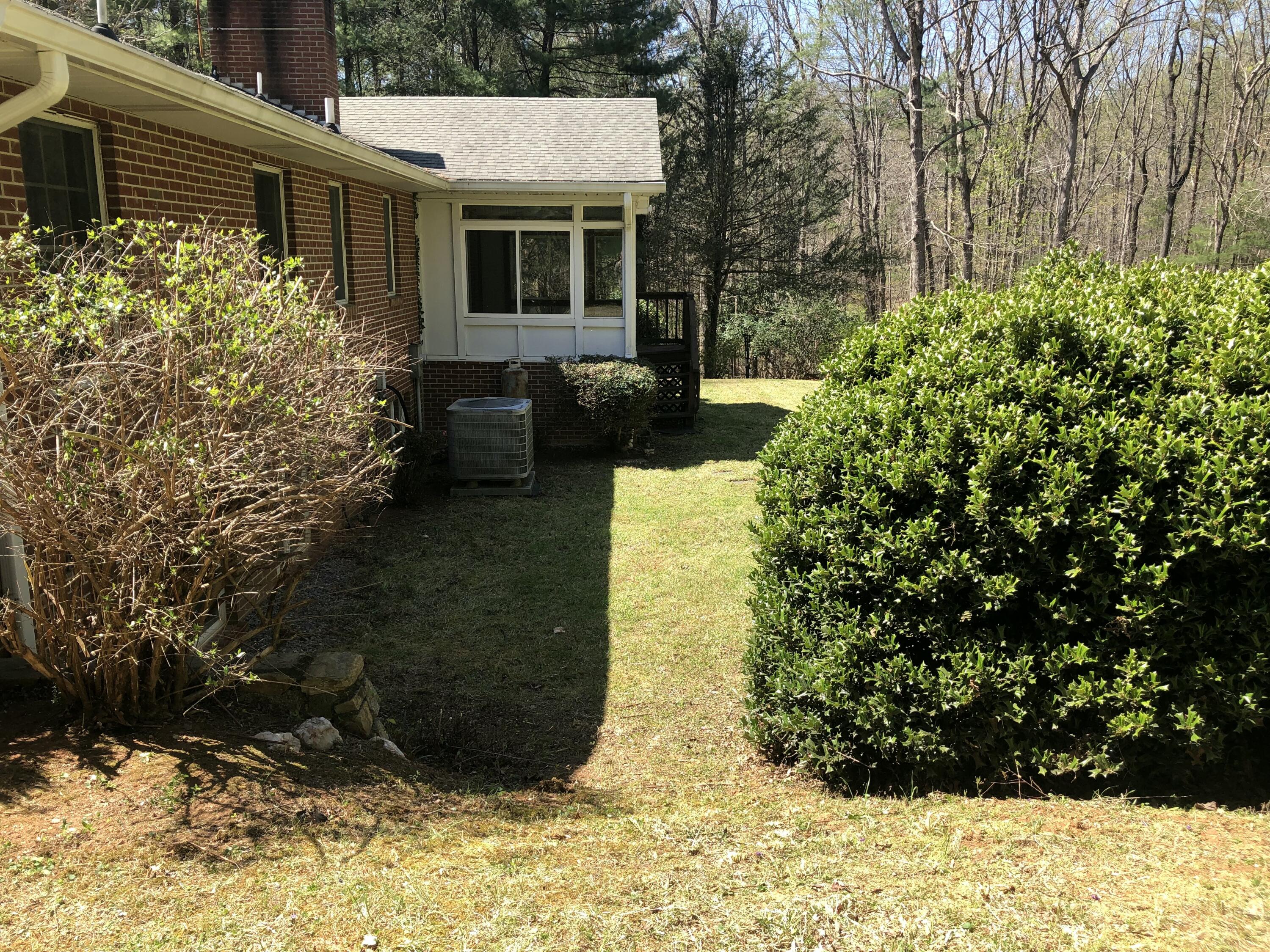 3105 Bethany Road Boones Mill, VA 24065 - Photo 34 of 42 a view of a house with backyard and garden