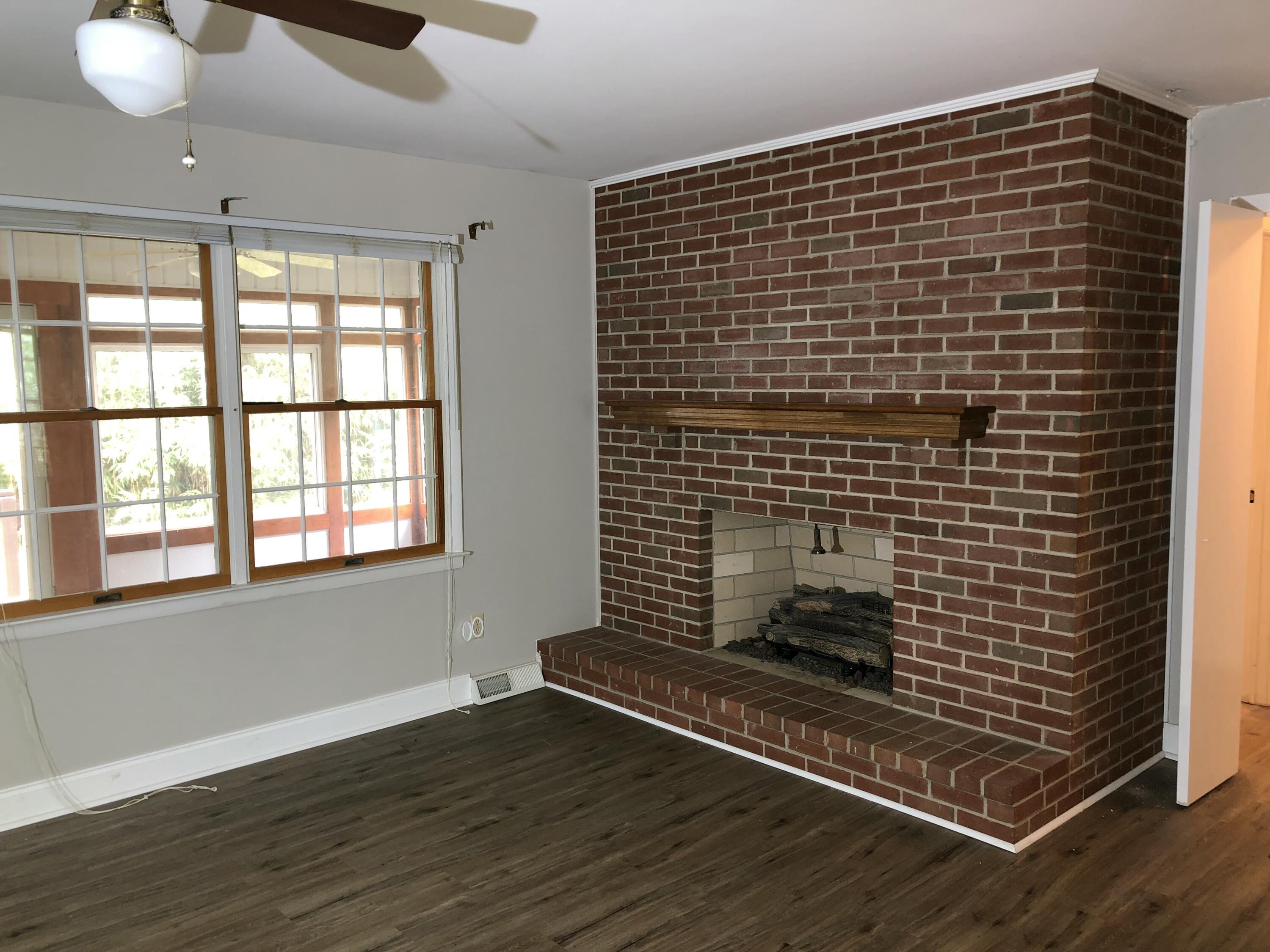 3105 Bethany Road Boones Mill, VA 24065 - Photo 9 of 42 a view of wooden floor with a chair