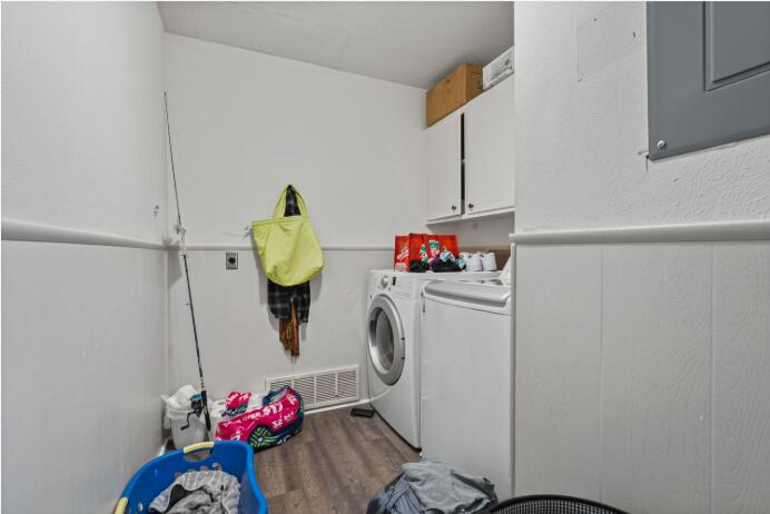 3008 68th Street Lubbock, TX 79413 - Photo 11 of 12 a utility room with dryer and washer