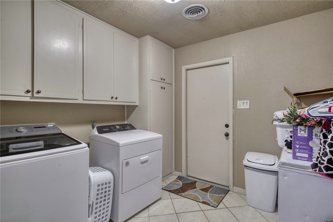 3501 Midwest Drive Bryan, TX 77802 - Photo 26 of 31 a room with storage and utility