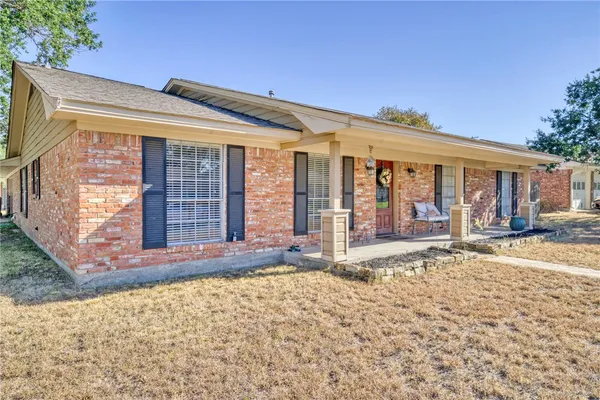 a view of a house with a patio