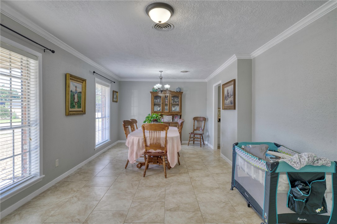 3501 Midwest Drive Bryan, TX 77802 - Photo 8 of 31 a dining room with furniture and window