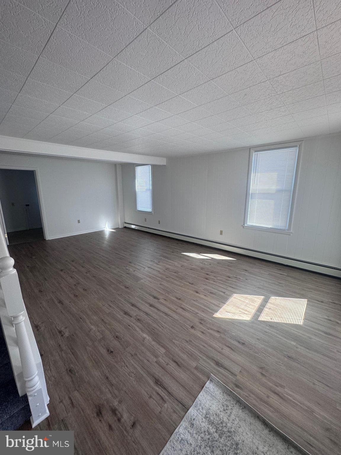222 Armstrong Street Halifax, PA 17032 - Photo 11 of 18 a view of empty room with wooden floor