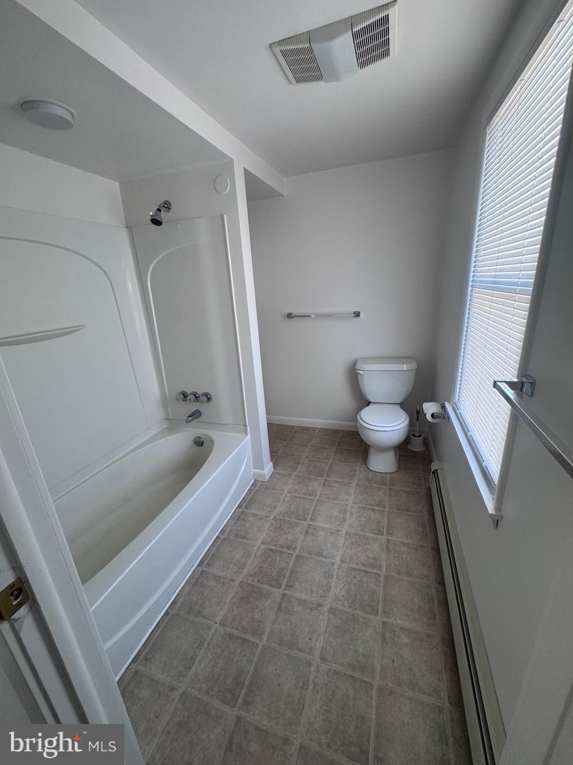 222 Armstrong Street Halifax, PA 17032 - Photo 15 of 18 a bathroom with a tub and a toilet
