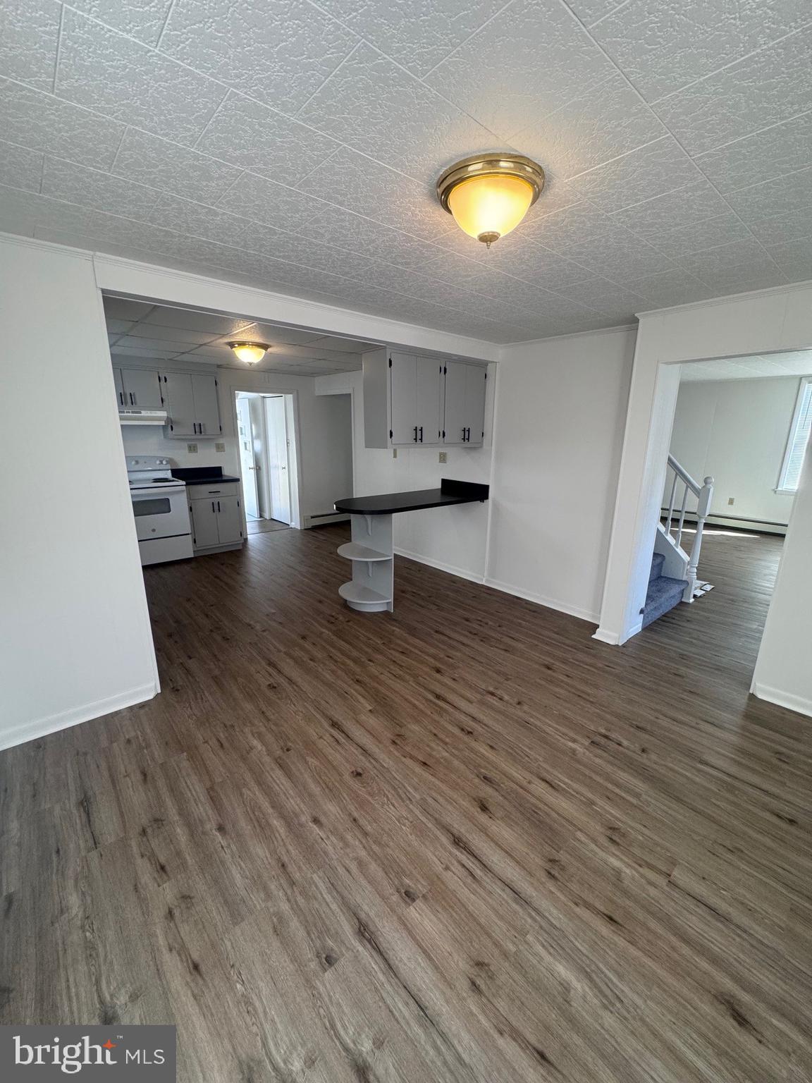 222 Armstrong Street Halifax, PA 17032 - Photo 6 of 18 a view of empty room with wooden floor