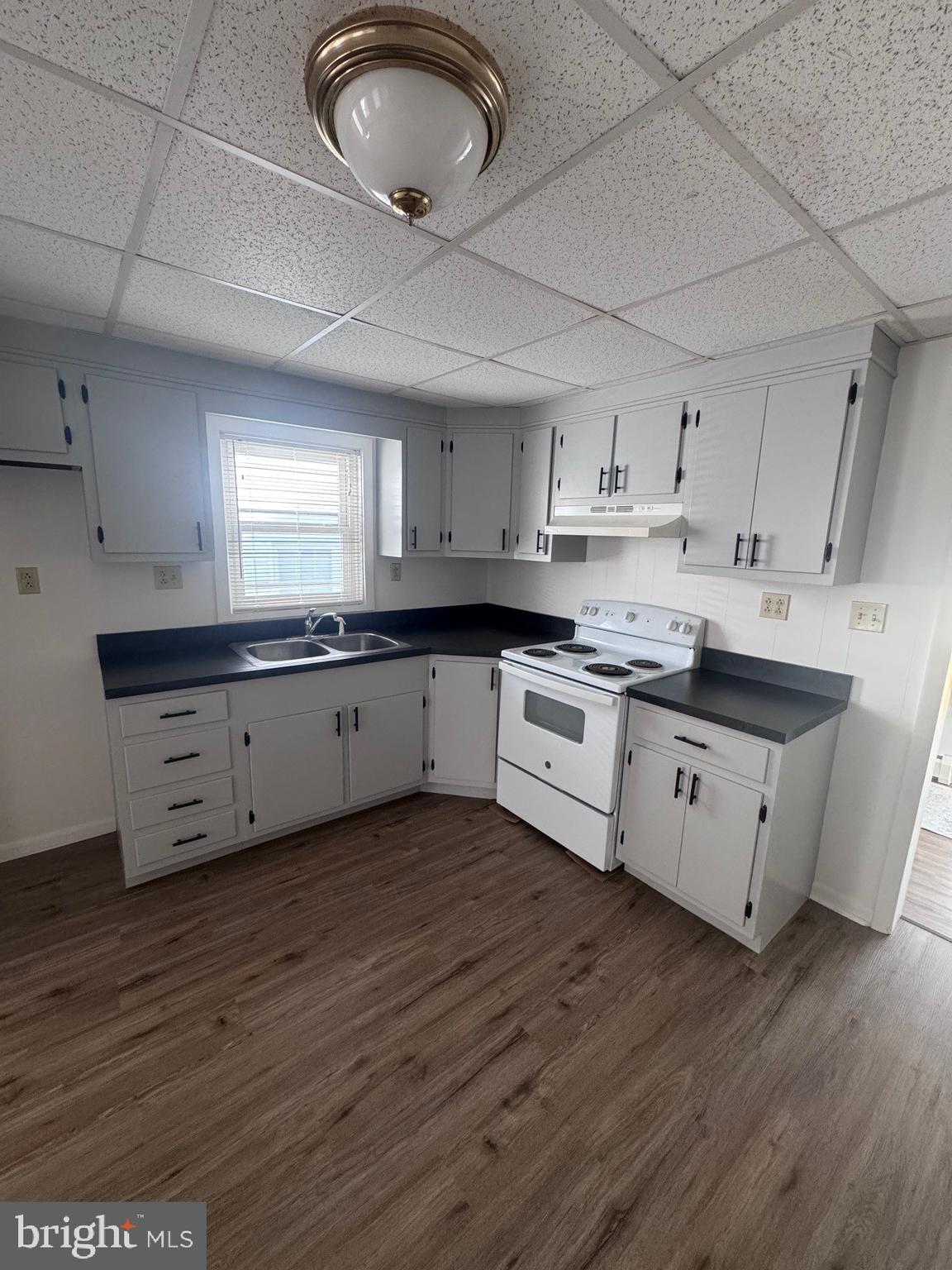 222 Armstrong Street Halifax, PA 17032 - Photo 8 of 18 a large kitchen with stainless steel appliances granite countertop a sink a stove a refrigerator and cabinets