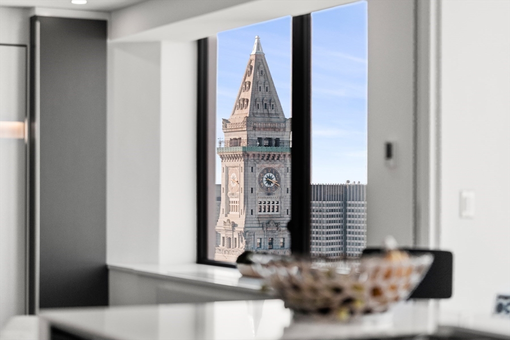 85 East India Row, Unit PHAB Boston, MA 02110 - Photo 21 of 42 a view of a hallway with windows