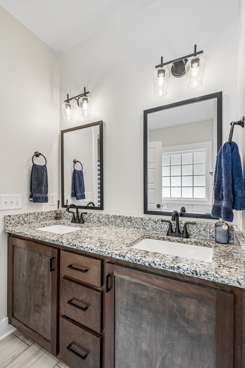 1845 Dinsmore Road Clarksville, TN 37040 - Photo 17 of 36 a bathroom with a granite countertop sink and a mirror