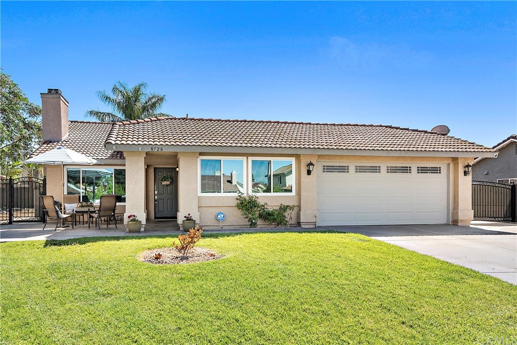 8728 Senna Lane Riverside, CA 92508 - Photo 1 of 1 a view of a house with backyard porch and sitting area