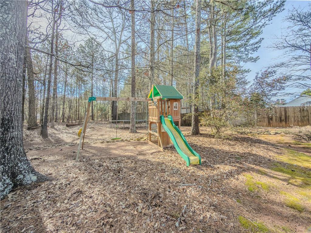 3100 Oak Ridge Lane Loganville, GA 30052 - Photo 36 of 43 a view of a park with a slide