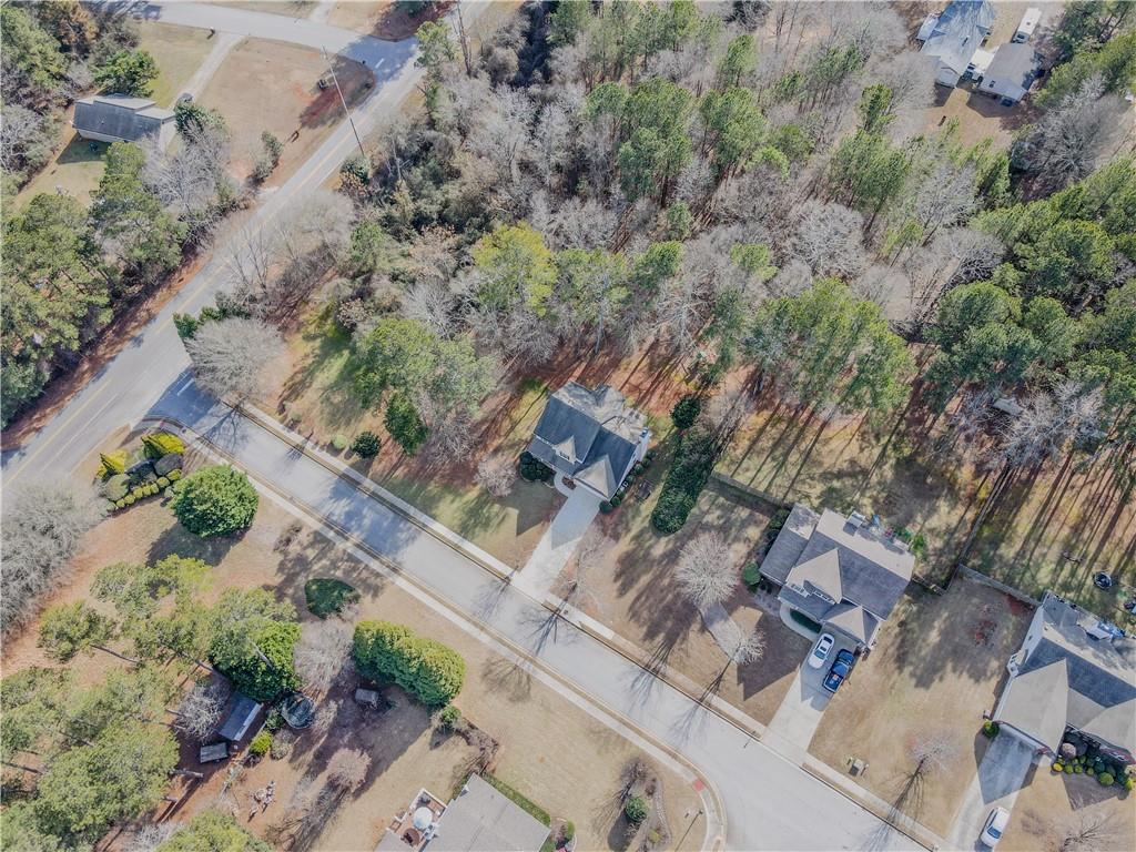3100 Oak Ridge Lane Loganville, GA 30052 - Photo 41 of 43 an aerial view of residential houses with outdoor space