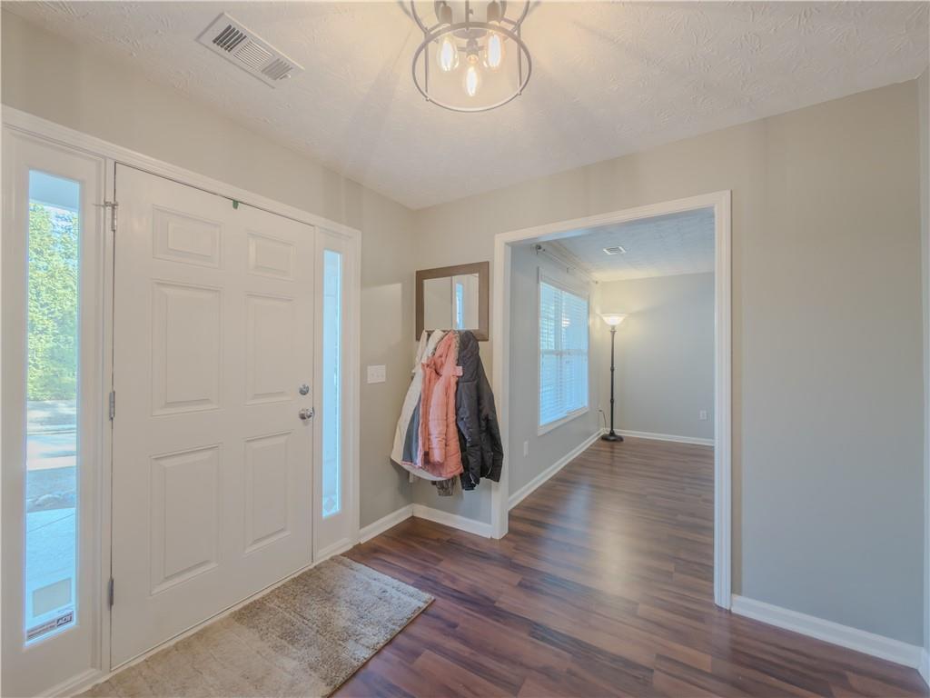 3100 Oak Ridge Lane Loganville, GA 30052 - Photo 5 of 43 a view of a room with gym equipment