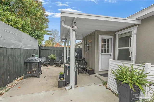 a view of backyard with seating space