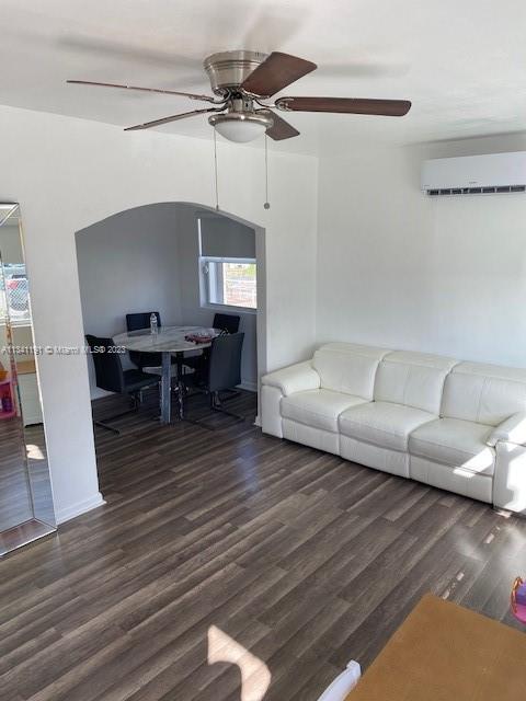 West Flagler Miami, FL 33125 - Photo 3 of 11 a living room with furniture and a wooden floor