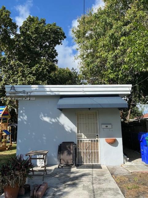 West Flagler Miami, FL 33125 - Photo 9 of 11 a front view of a house