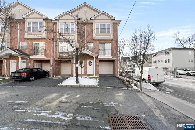 a view of a street with cars