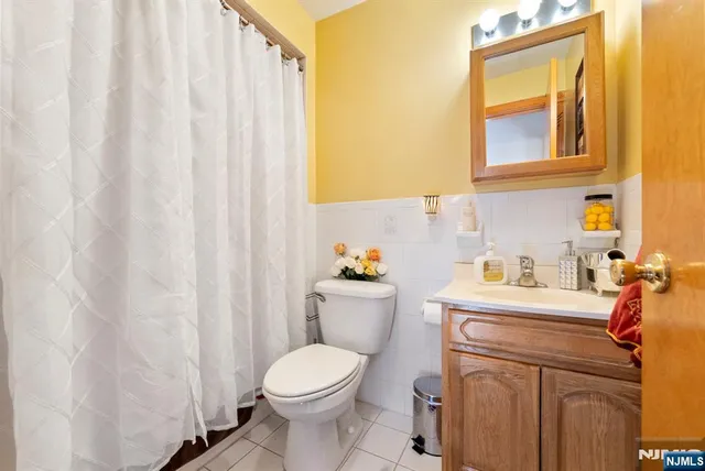 a view of bathroom with a sink and a toilet