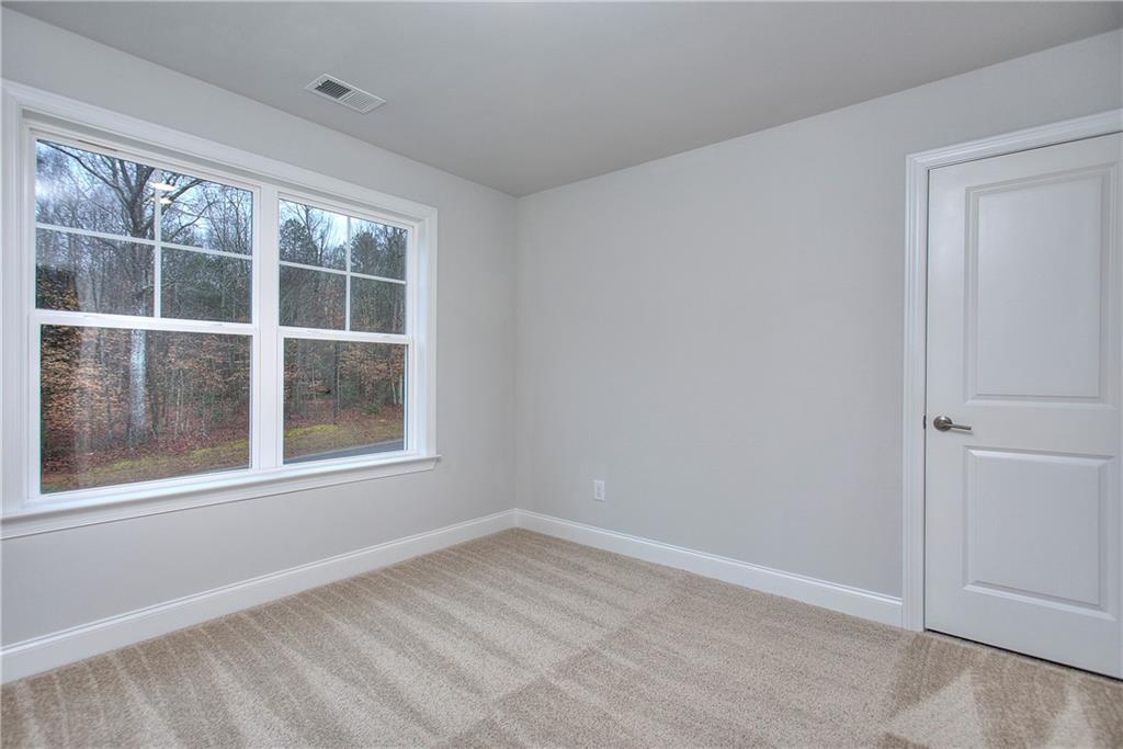 2604 Parkside Way Gainesville, GA 30507 - Photo 2 of 35 an empty room with a window