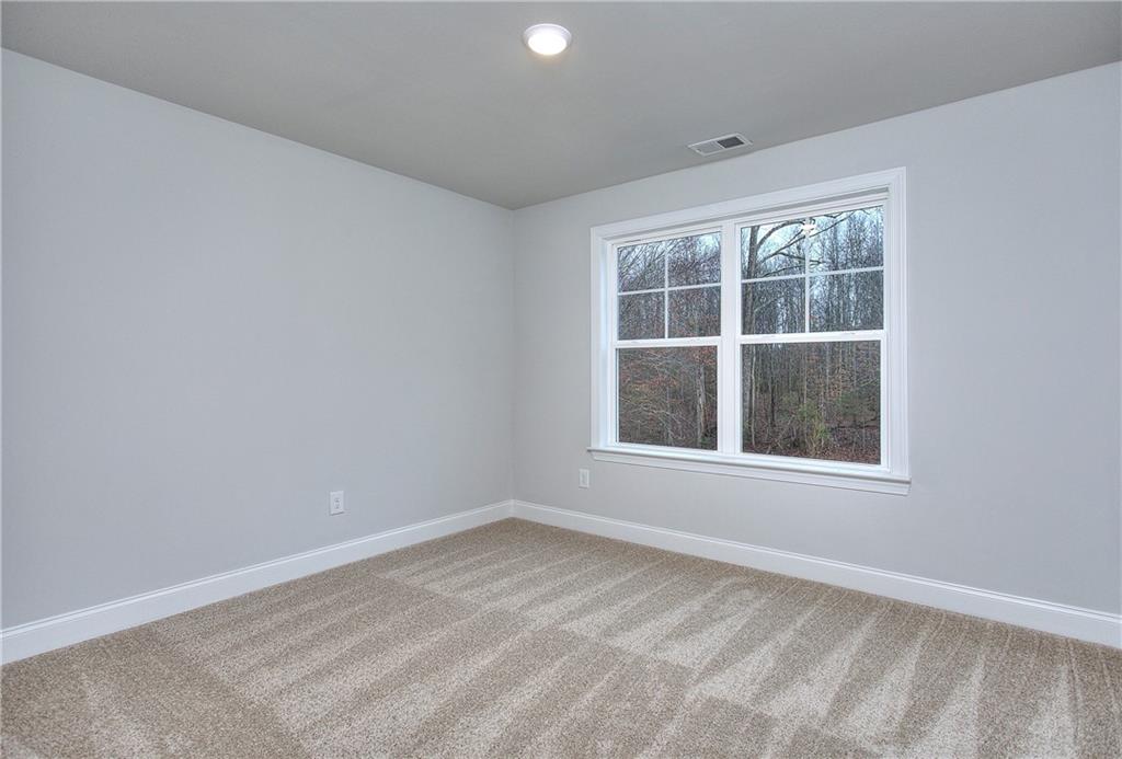 2604 Parkside Way Gainesville, GA 30507 - Photo 7 of 35 an empty room with a window