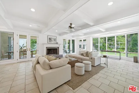 a kitchen with stainless steel appliances granite countertop a sink and a counter top space