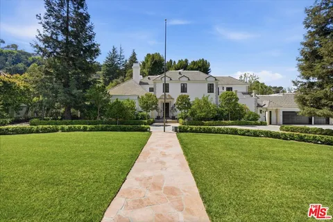a view of a house with a big yard