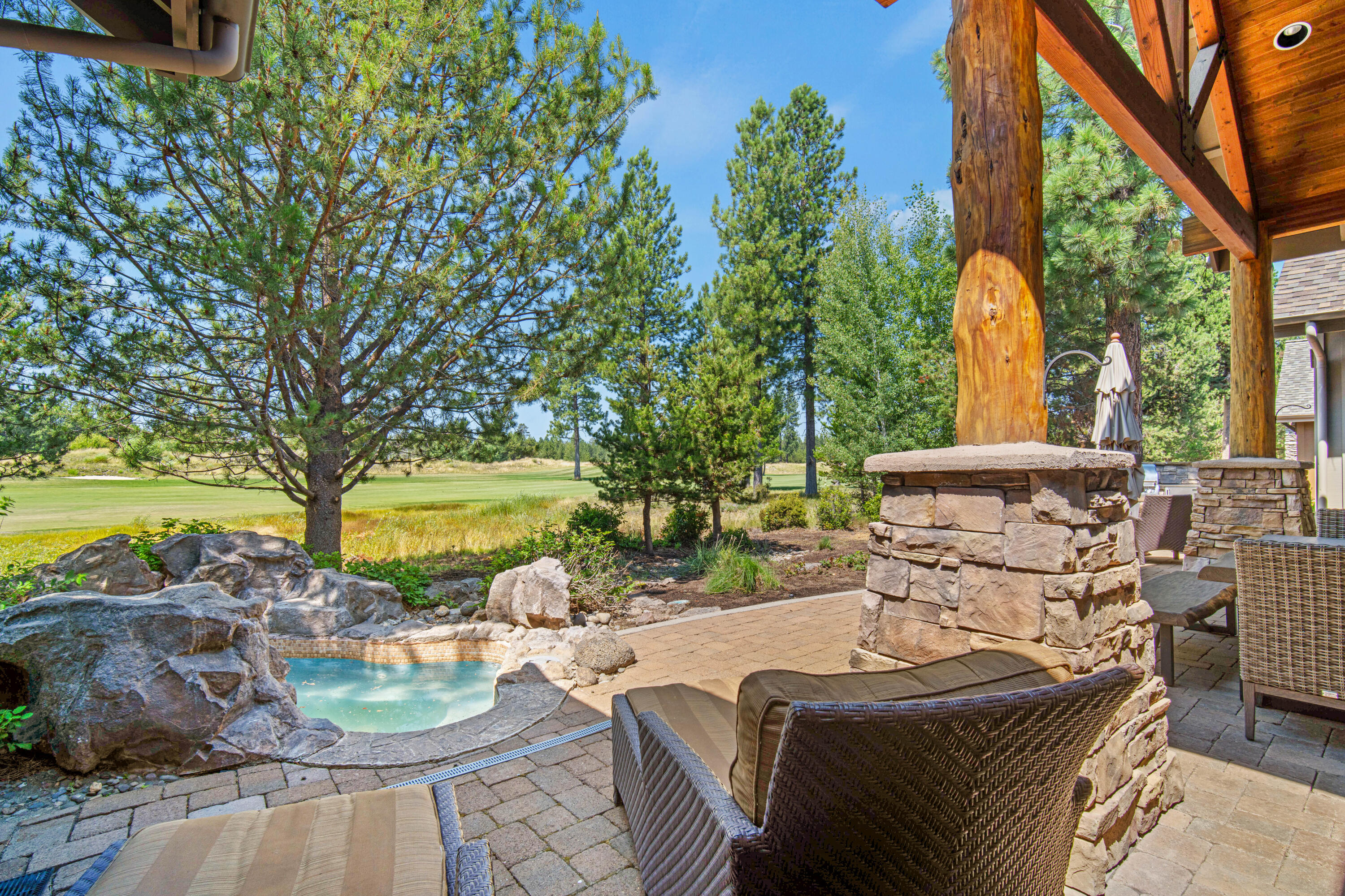 56689 Dancing Rock Loop Bend, OR 97707 - Photo 44 of 51 a view of swimming pool with outdoor seating and plants