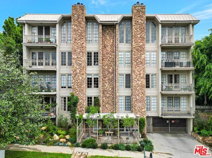a front view of a multi story residential apartment building