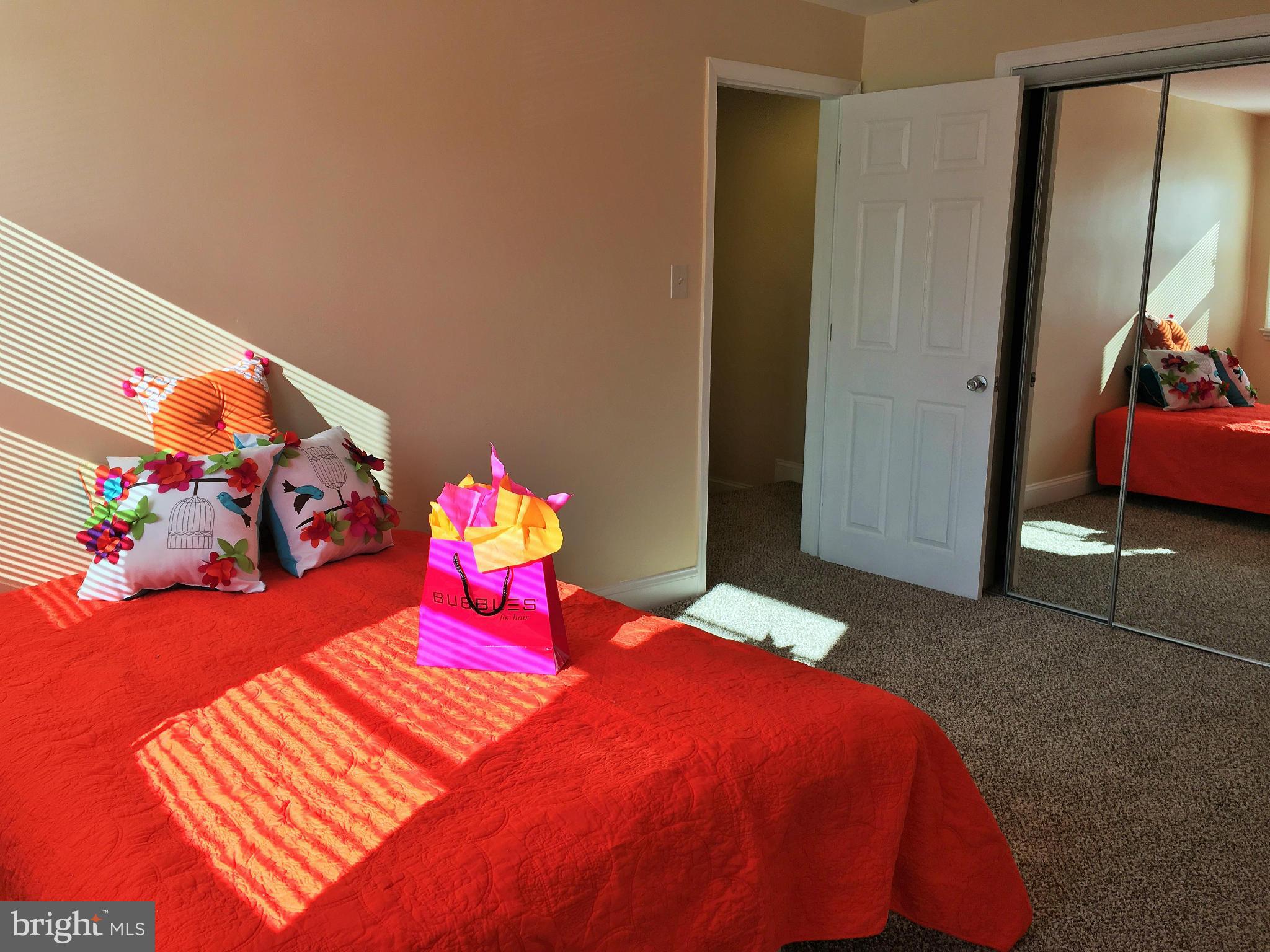 1624 Walterswood Road Baltimore, MD 21239 - Photo 11 of 28 Bedroom with Mirrored Closet Door