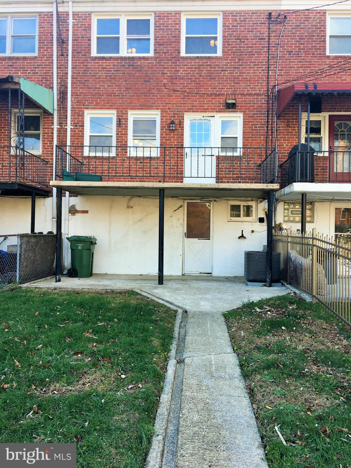 1624 Walterswood Road Baltimore, MD 21239 - Photo 27 of 28 Exterior with patio and fenced back yard.