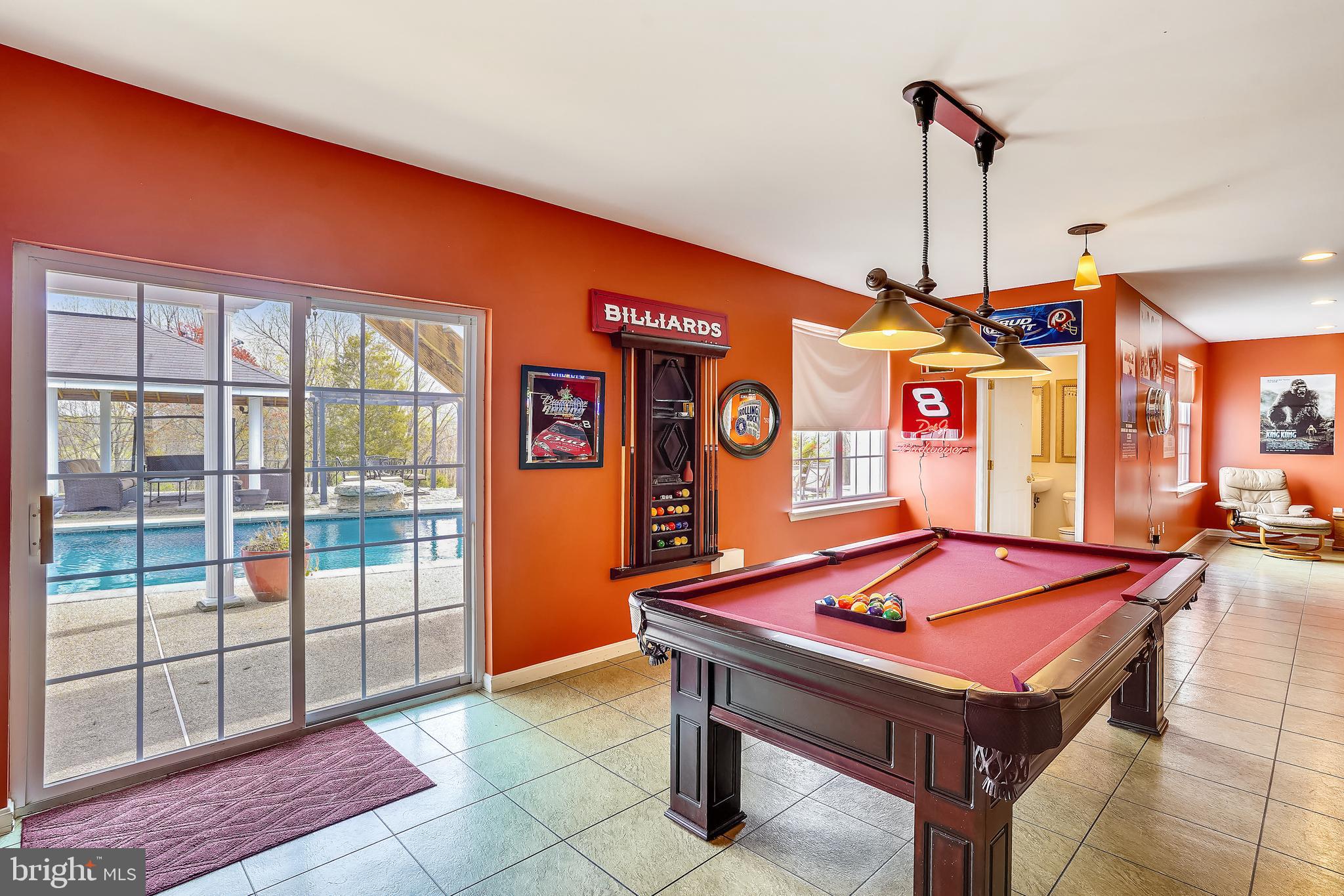 23907 Old Hundred Road Dickerson, MD 20842 - Photo 64 of 126 LOWER LEVEL Game Room out to In-ground POOL
