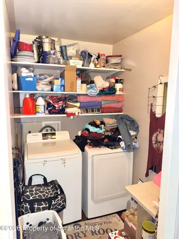 a kitchen with a stove and cabinets