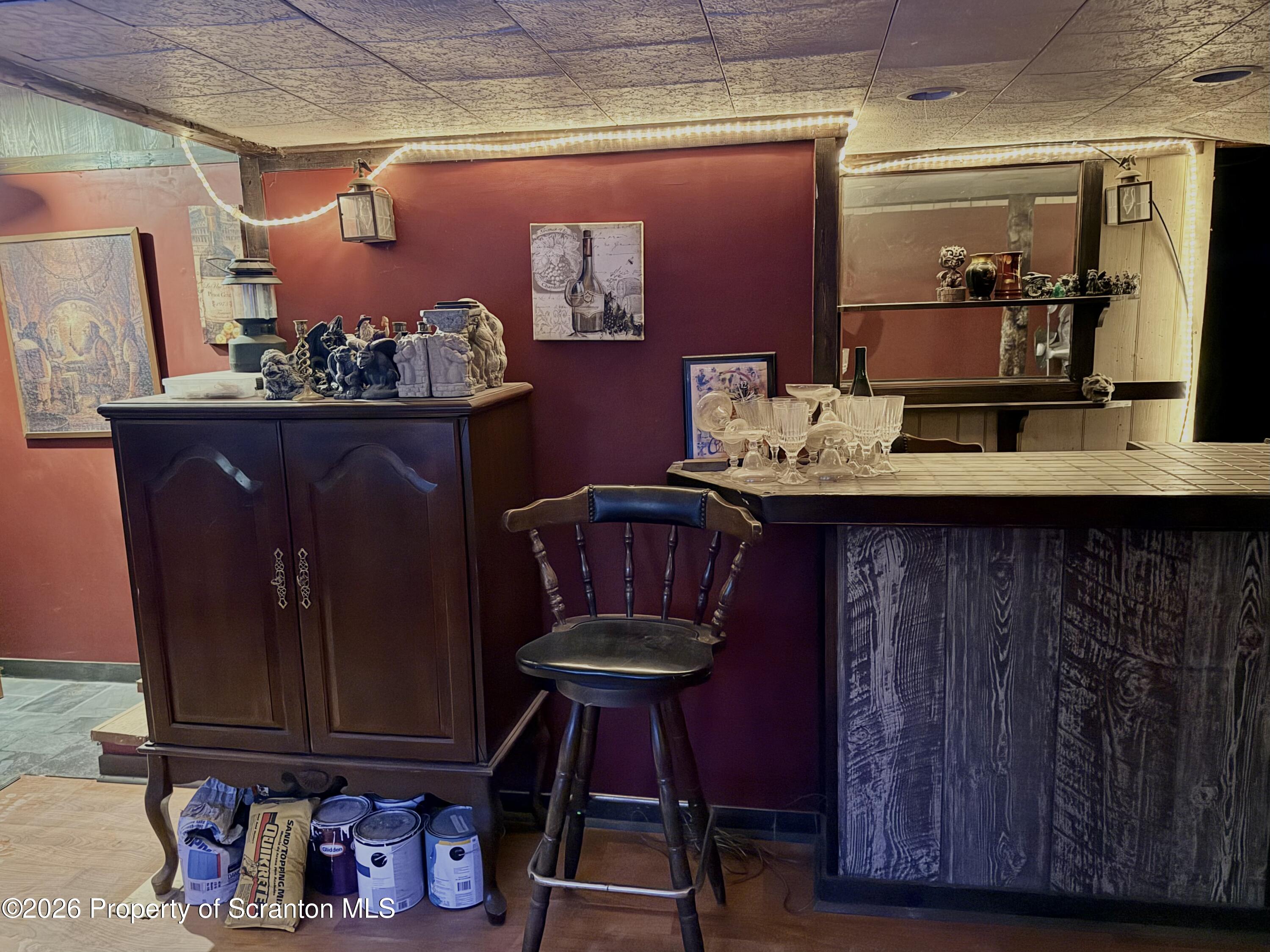 338 Bailey Street Clarks Summit, PA 18411 - Photo 20 of 27 a kitchen with stainless steel appliances granite countertop a sink and cabinets