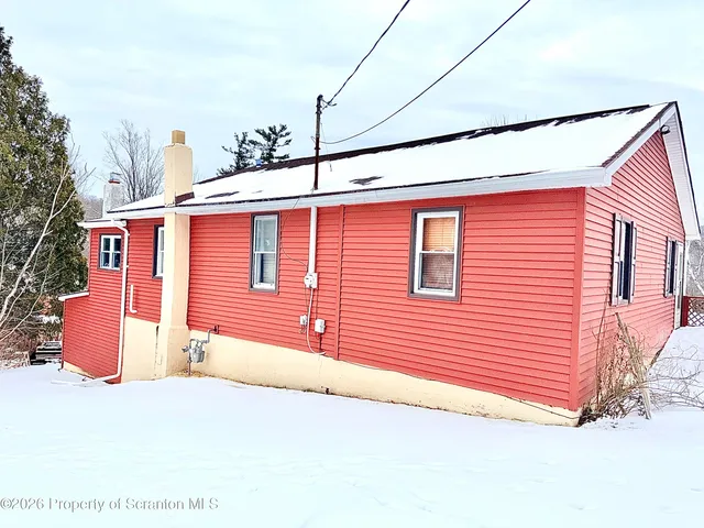 a front view of a house with a garage