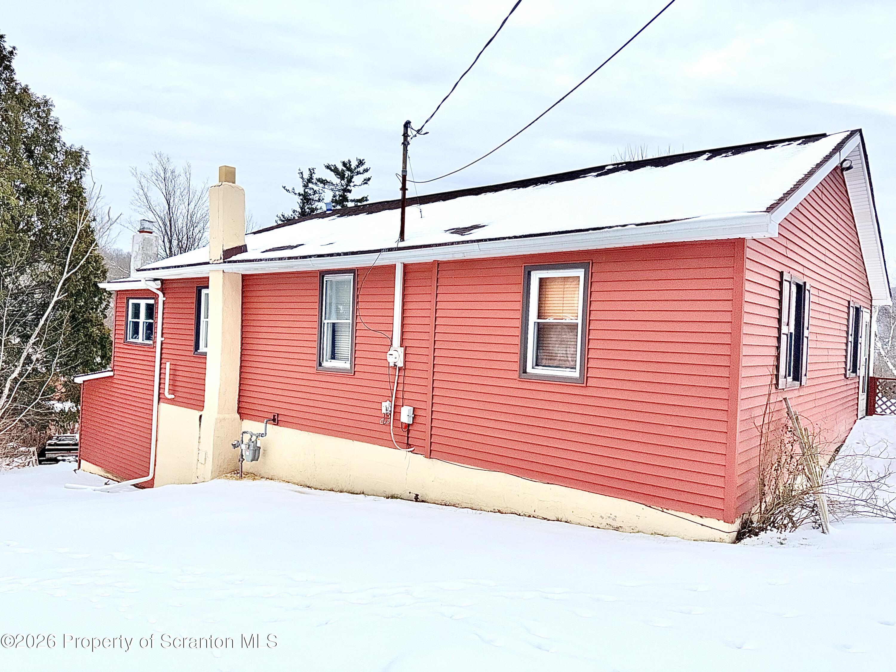 338 Bailey Street Clarks Summit, PA 18411 - Photo 24 of 27 a front view of a house with a garage