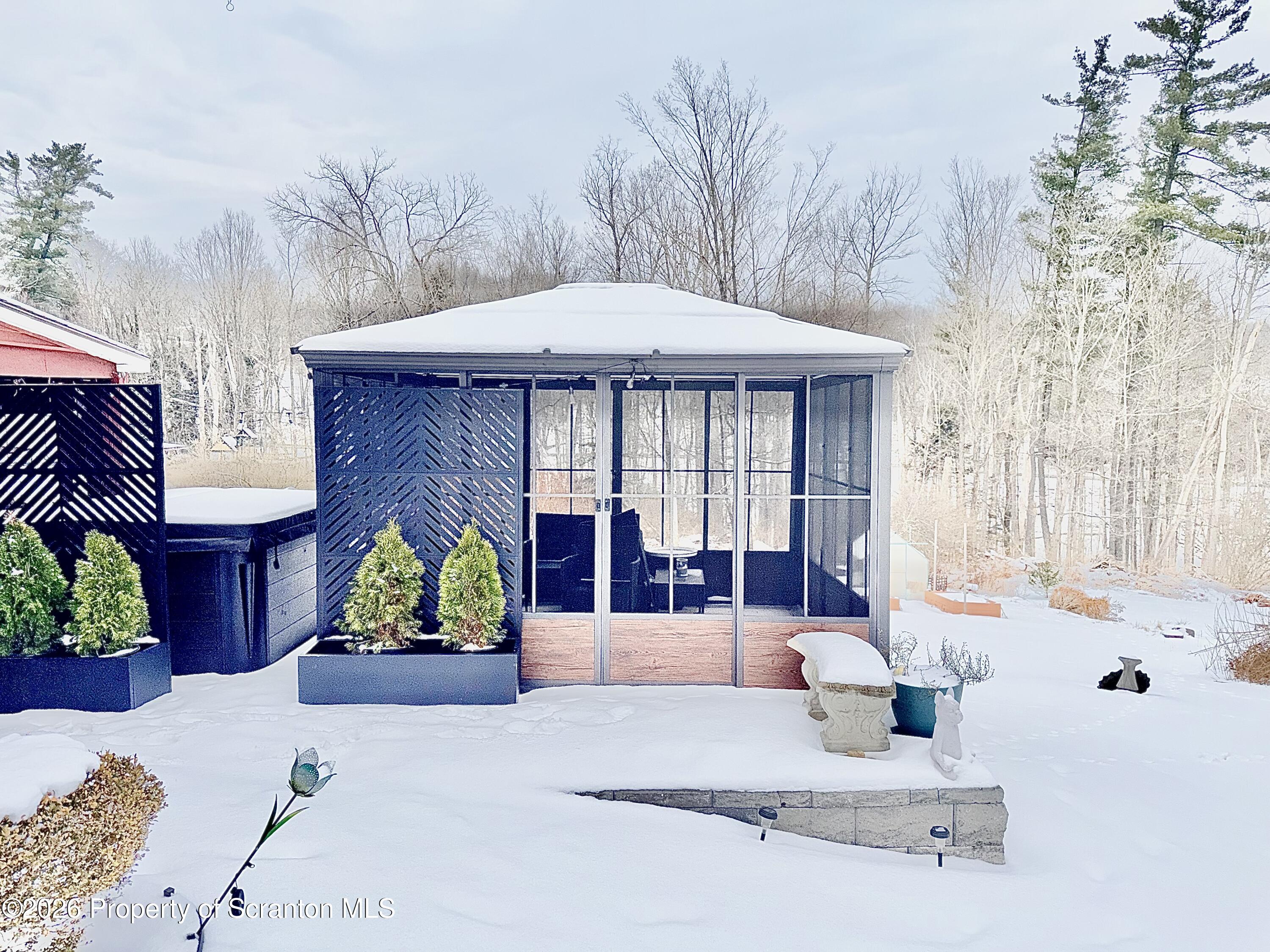 338 Bailey Street Clarks Summit, PA 18411 - Photo 24 of 24 a front view of a house with garden