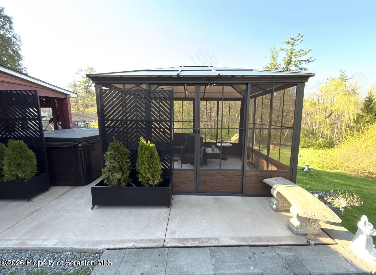 338 Bailey Street Clarks Summit, PA 18411 - Photo 3 of 24 a front view of a house with outdoor seating