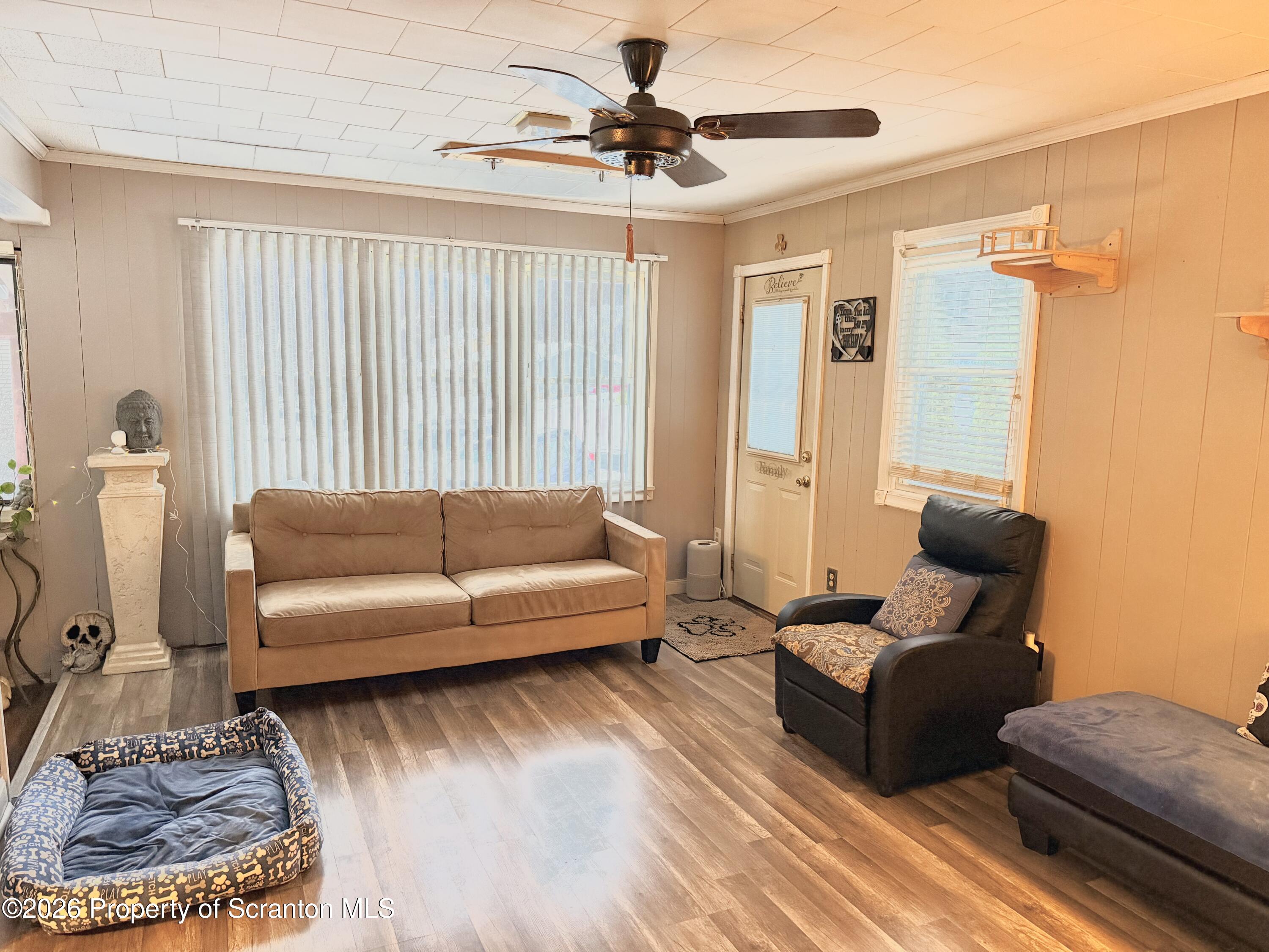338 Bailey Street Clarks Summit, PA 18411 - Photo 5 of 24 a living room with furniture and a rug