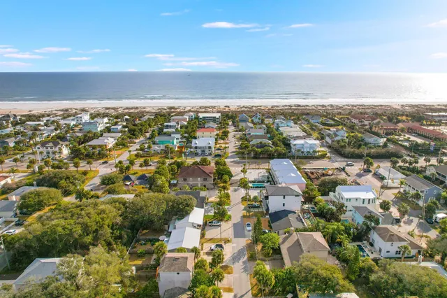 an aerial view of residential building with parking space