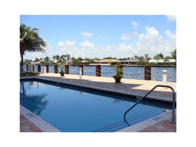 821 North Riverside Drive, Unit 903 Pompano Beach, FL 33062 - Photo 15 of 17 a view of swimming pool with outdoor seating