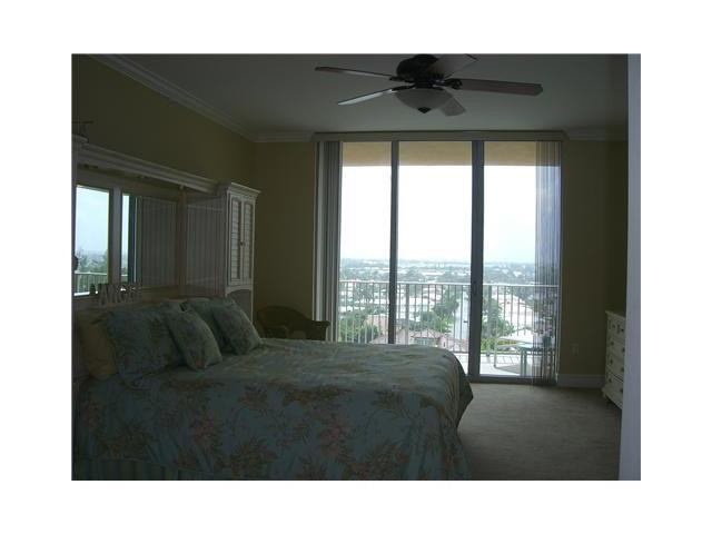 821 North Riverside Drive, Unit 903 Pompano Beach, FL 33062 - Photo 6 of 17 a black and white photo of a living room