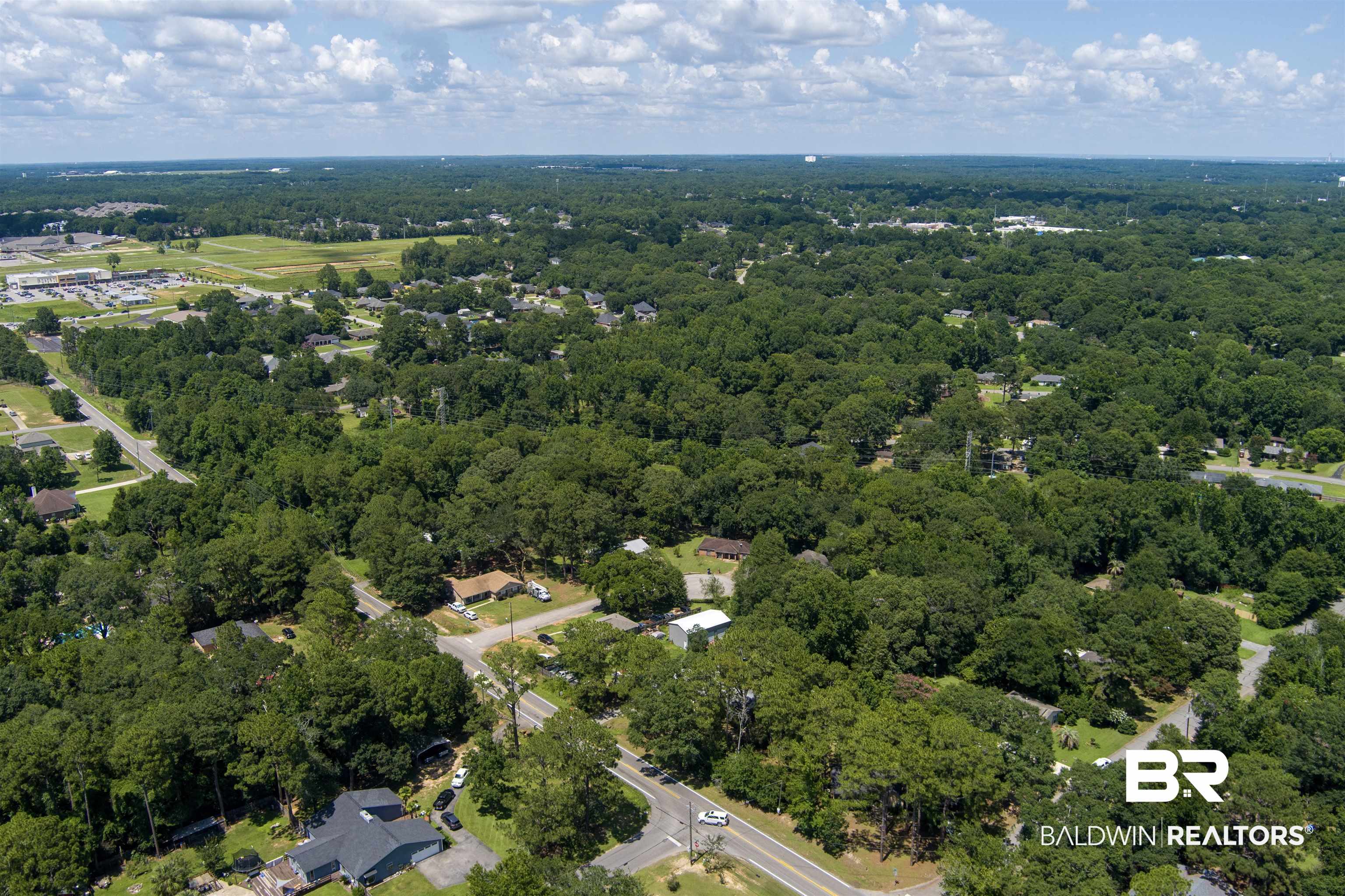 0 McFarland Road Mobile, AL 36695 - Photo 9 of 11 Aerial overview of property's location with a heavily wooded area